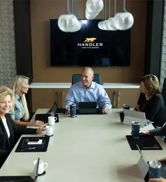 Handler team at the conference table